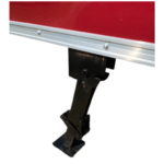 The front end of a red Fold Down Stabilizer Jacks.